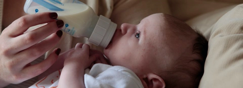 feeding milk to baby